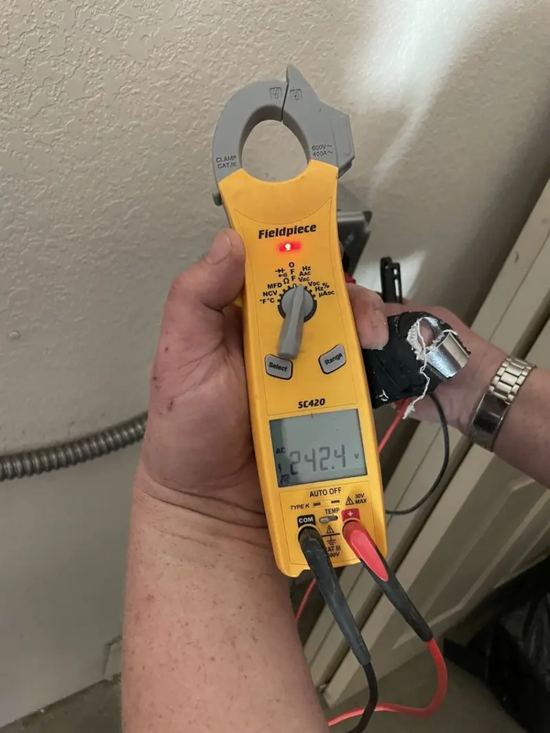 Voltage testing with clamp meter during Hot Tub / Pool Electrical Wiring in Forest Hills